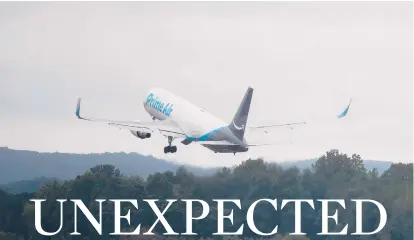  ??  ?? ABOVE: Last week, ticket counters at Bradley Internatio­nal Airport in Windsor Locks were busy with vacation travelers, who are fueling a surge in air travel nationwide this summer.