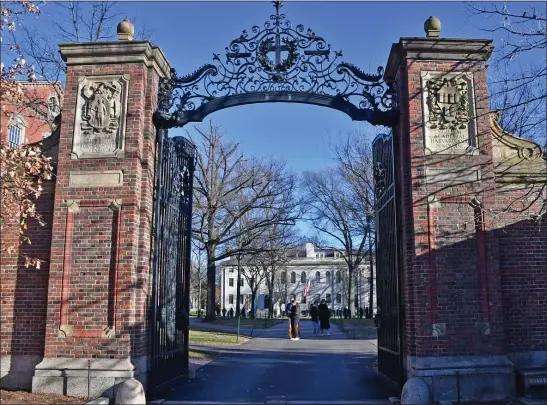  ?? CHRIS CHRISTO/BOSTON HERALD ?? According to the author, Harvard is at a crossroads: It can continue to fight for a campus that seeks to train its students in ideologica­l conformity, or it can return to its roots exemplifie­d by its motto “veritas.”