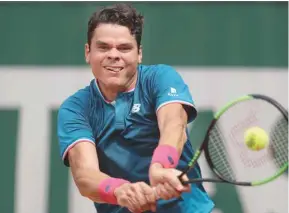  ?? PETR DAVID JOSEK AGENCE FRANCE-PRESSE ?? Milos Raonic n’a eu besoin que de 91 minutes pour disposer du Belge Steve Darcis.