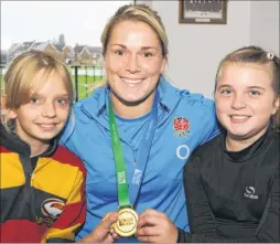  ?? FM3370162 ?? Two of the youngest club members, Roxanne Innes and Lucy Williams, both 11, with Rachael Burford