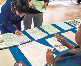  ?? GABBY JONES BLOOMBERG FILE PHOTO ?? Firms today are using job titles to show “you can have an impact,” especially for younger workers.