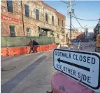  ?? ?? Signs direct North Market visitors around the constructi­on that has started for the Merchant Building developmen­t.
BELOW LEFT: Rick Harrison Wolfe, the chief executive officer of The North Market, discusses the impact of the constructi­on project.