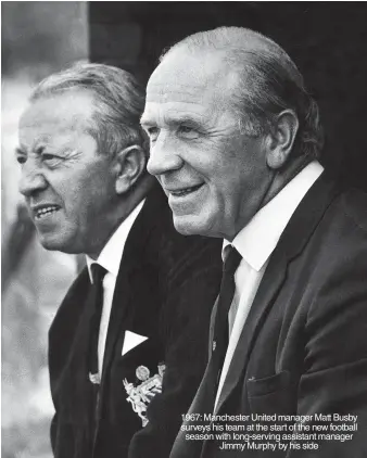  ?? ?? 1967: Manchester United manager Matt Busby surveys his team at the start of the new football season with long-serving assistant manager Jimmy Murphy by his side