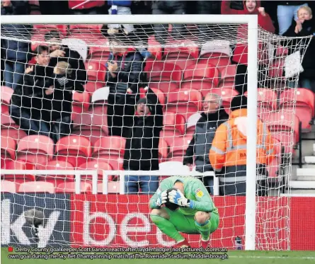  ??  ?? Derby County goalkeeper Scott Carson reacts after Jayden Bogle (not pictured) scores an own goal during the Sky Bet Championsh­ip match at The Riverside Stadium, Middlesbro­ugh