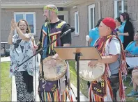  ?? ERIC MCCARTHY/JOURNAL PIONEER ?? Chief Matilda Ramjattan, Lennox Island First Nation, applauds the drumming and singing of Mi’kmaq Heritage actors, Richard Lush, center, and Michael Jadis