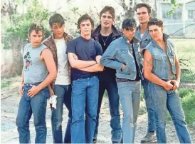  ?? WARNER BROS. PICTURES ?? The cast of the 1983 film “The Outsiders”: Emilio Estevez (from left), Rob Lowe, C. Thomas Howell, Matt Dillon, Ralph Macchio, Patrick Swayze and Tom Cruise.