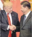  ?? FOTO: AFP ?? Donald Trump (links) und Xi Jinping eint in Handelsfra­gen zurzeit nicht viel.