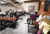  ?? KEITH SRAKOCIC / AP ?? Election workers continue the process of counting ballots for the Pennsylvan­ia primary election on Wednesday at the Mercer County Elections Board in Mercer, Pa.