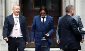  ?? Photograph: Henry Nicholls/Reuters ?? Depp is suing News Group Newspapers and its executive editor, Dan Wootton, over an article that called him a ‘wife beater’.