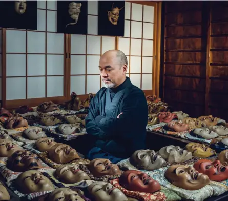  ??  ?? Clockwise from
far left: Yodoe umbrella artisan Emiko Yamamoto; master carver Koukun Otsuki surrounded by his private collection of Noh masks; the embossed back of a makyo ( magic mirror) from the Yamamoto workshop in Kyoto; painting a lantern at Ozeki & Co.