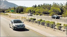  ??  ?? Google Map Steel-cable barriers are being used along Summerlin Parkway. The network of high-tension cables is supposed to create a springlike effect that supports the weight of vehicles straying from the road.