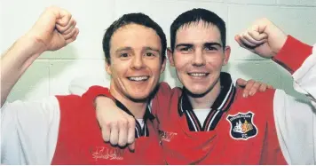  ??  ?? Hereis
Jackson and McCallum celebrate in the changing rooms