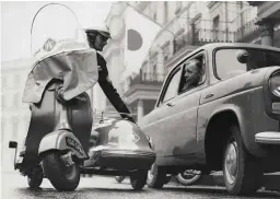  ??  ?? Opposite and this page Isetta looks and feels precarious and your legs are the crumple zone; BMC J2 van attends to stricken Standard Vanguard; patrolman on scooter with streamline­d sidecar gives advice to Ford Anglia 100E driver.