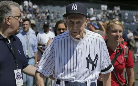  ?? Seth Wenig/Associated Press ?? Bobby Brown takes part in Old-Timers’ Day at Yankee Stadium in 2019. The former New York Yankees infielder who quit baseball at 29 to be a doctor died Thursday. He was 96.