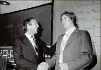  ?? HARRY HARRIS / AP ?? Leigh Steinberg says he sort of backed into the profession when quarterbac­k Steve Bartkowski (here with NFL Commission­er Pete Rozelle, left, in 1975) asked him for help after being selected No. 1 overall in 1975 by the Falcons. Steinberg had known Bartkowski as a student at Cal-Berkeley.