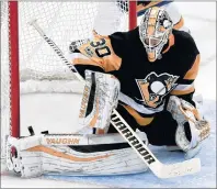  ?? AP PHOTO ?? In this Oct. 7, 2017, file photo, Pittsburgh Penguins goalie Matt Murray (30) makes a save in the third period against the Nashville Predators during an NHL hockey game, in Pittsburgh.