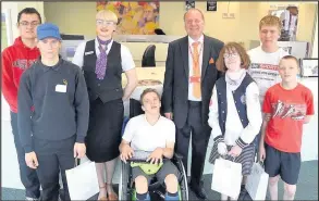  ??  ?? The team from WizeUp, a financial education organisati­on sponsored by the Hinckley and Rugby Building Society, spent a day with pupils from Dorothy Goodman School. Pictured: (L-R) Hinckley and Rugby’s Georgia Betteridge and Ed Flack of WizeUp with...