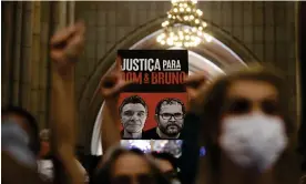  ?? Photograph: Marcelo Chello/AP ?? People attend a service honoring Dom Phillips and the Bruno Pereira in São Paulo, Brazil, in July 2022.