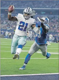  ?? Ap photo ?? In this December 2016 photo, Dallas Cowboys’ Ezekiel Elliott (21) leaps into the end zone after getting past Detroit Lions’ Tahir Whitehead for a touchdown during an NFL game in Arlington, Texas.