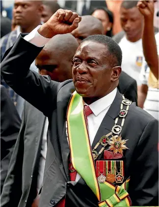  ?? PHOTO: REUTERS ?? Zimbabwe’s new president Emmerson Mnangagwa waves to his suppoters as after the swearing in ceremony in Harare.