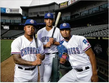  ?? JAY JANNER / AMERICAN-STATESMAN ?? Willie Calhoun (left), Ronald Guzman and Yohander Mendez are considered to be important future contributo­rs for the Texas Rangers and keys to an improved season for the Express.