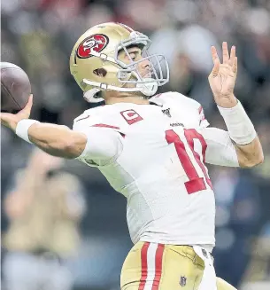  ?? JONATHAN BACHMAN GETTY IMAGES ?? Jimmy Garoppolo led the San Francisco 49ers to the top seed in the NFC, but he also threw the most regular-season intercepti­ons among the eight starting quarterbac­ks left in the playoffs.