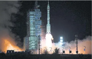  ?? ?? IT’S A BLAST: A Long March-2F carrier rocket, carrying the Shenzhou-13 spacecraft with the second crew of three astronauts to China’s new space station, lifts off from the Jiuquan Satellite Launch Centre.