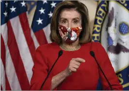  ?? JACQUELYN MARTIN — THE ASSOCIATED PRESS ?? House Speaker Nancy Pelosi, of California, speaks during her weekly briefing on Capitol Hill in Washington on Friday.