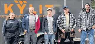  ??  ?? Jessica King, electrical apprentice; Terry Freeman, solar installer-crew lead; Andy Spidle, electricia­n and technical specialist; Calvin Huxter, solar installer-crew lead; and Jeff Kieran, solar installer.