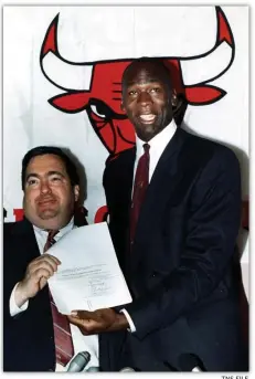  ?? TNsFILe ?? FALL GUY: Chicago Bulls general manager Jerry Krause (left) with NBA legend Michael Jordan during a press conference.
