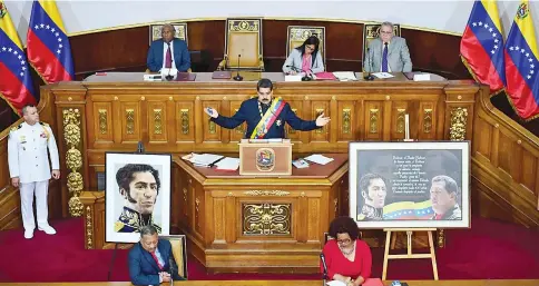  ??  ?? Maduro addresses the all-powerful pro-Maduro assembly which has been placed over the National Assembly and tasked with rewriting the constituti­on, in Caracas. — AFP photo