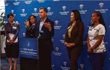  ?? Yalonda M. James/The Chronicle ?? Health and Human Services Secretary Xavier Becerra announces the launch of the Health Workforce Initiative alongside Oakland Mayor Sheng Thao (second from right) at Samuel Merritt University.