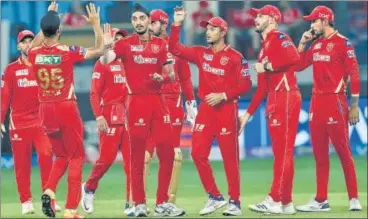  ?? ANI ?? Arshdeep Singh of Punjab Kings celebrates the wicket of Evin Lewis of Rajasthan Royals in Dubai on Tuesday.