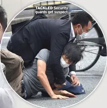  ?? ?? TACKLED Security guards get suspect