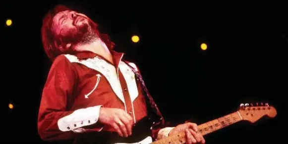  ?? 1996-98 ACCUSOFT INC., ALL RIGHT/COURTESY OF TIFF ?? Iconic guitar-slinger Eric Clapton is the subject of star-studded documentar­y Eric Clapton: Life in 12 Bars, an in-depth look at his tumultuous five-decade career and occasional­ly tragic life.