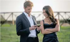  ??  ?? MATT Barr as Danny McNamara with Sofia Pernas as Lexi Vaziri in the action-adventure drama, Blood & Treasure.