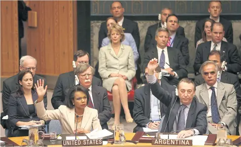  ?? NYT ?? Ambassador John Bolton sits behind Secretary of State Condoleezz­a Rice during a United Nations Security Council meeting in New York on Aug 11, 2006.