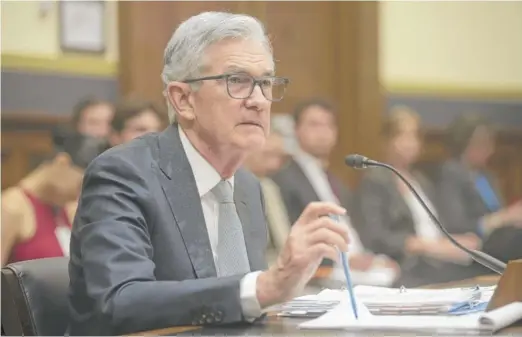  ?? KEVIN WOLF/AP ?? Federal Reserve Chairman Jerome Powell testifying before the House Financial Services Committee on June 23.