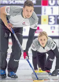  ?? MICHAEL BURNS/CURLING CANADA ?? Laura Crocker and Geoff Walker have won all five of their games so far at the Olympic mixed doubles trials.