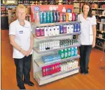  ??  ?? Wilreen Lewis and Melody McCulloch of Gordon’s Chemists on George Street in Oban welcome
customers for the 99p sale.