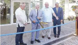  ??  ?? (From left) US Embassy Chargé d’Affaires John Law, American Battle Monuments Commission (ABMC) commission­er Robert Wefald and Pacific superinten­dent Larry Adkinson with Defense POW/MIA Accounting Agency director Kelly McKeague during the ribbon-cutting ceremony.