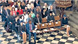  ??  ?? Right, the Queen, Duke of Edinburgh, Prince of Wales and Duchess of Cornwall arrive for the Commonweal­th Service at Westminste­r Abbey. Left, Theresa May was left waiting alone on the front row before she was joined by other guests