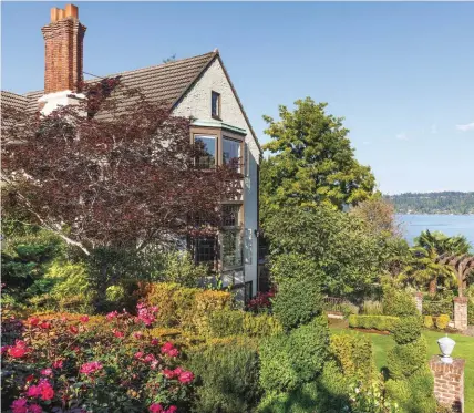  ??  ?? Phil Feldsine’s Tudor revival home along the shores of Lake Washington near Seattle.