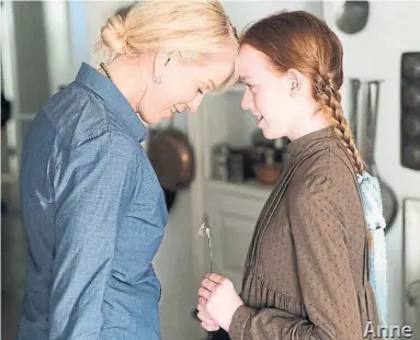  ?? CBC ?? Moira Walley-Beckett and series star Amybeth McNulty on the set of Anne with an E.