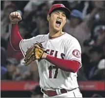  ?? Wally Skalij Los Angeles Times ?? SHOHEI OHTANI is fired up at the end of the sixth inning. He also homered and gave the game ball to manager Phil Nevin.