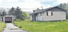  ?? SHARON MONTGOMERY-DUPE • CAPE BRETON POST ?? This house at 15 Cameron's Lane in New Victoria is one of 17 unsightly properties the Cape Breton Regional Municipali­ty will be starting to demolish this month. Paul Brown, who owns the house along with his brother Michael, said he didn't know it was up for demolition until he saw a story in the Cape Breton Post.