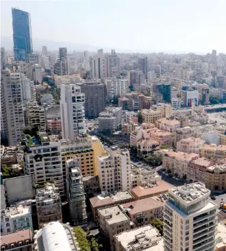  ?? (Mohamed Azakir/Reuters) ?? A GENERAL VIEW of Beirut’s central district. Lebanon is suffering from a $90-billion debt squeeze in addition to underdevel­oped services in various sectors.