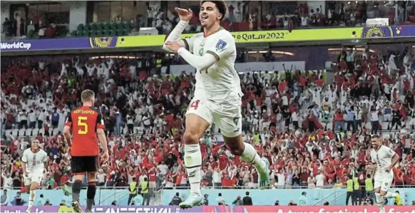  ?? /MATTHEW CHILDS / REUTERS ?? Morocco’s Zakaria Aboukhlal celebrates scoring their second goal to ensure his country achieves first World Cup win since they beat Scotland in 1998.