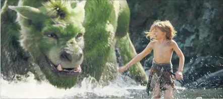  ?? [ Disney Enterprise­s] ?? Neuer Disney-Film für Ökoaktivis­ten und Esoteriker: Drache Elliot mit Dschungelk­ind Pete (Oakes Fegley).