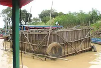  ??  ?? A fish cage used in the Tonle Sap.